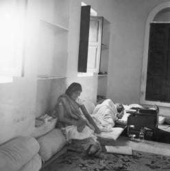 Abha Gandhi giving Gandhi a massage