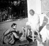 Lilavati washing Gandhi's feet