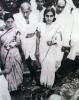 Gandhi walking with Abha Gandhi and Sushila Nayar